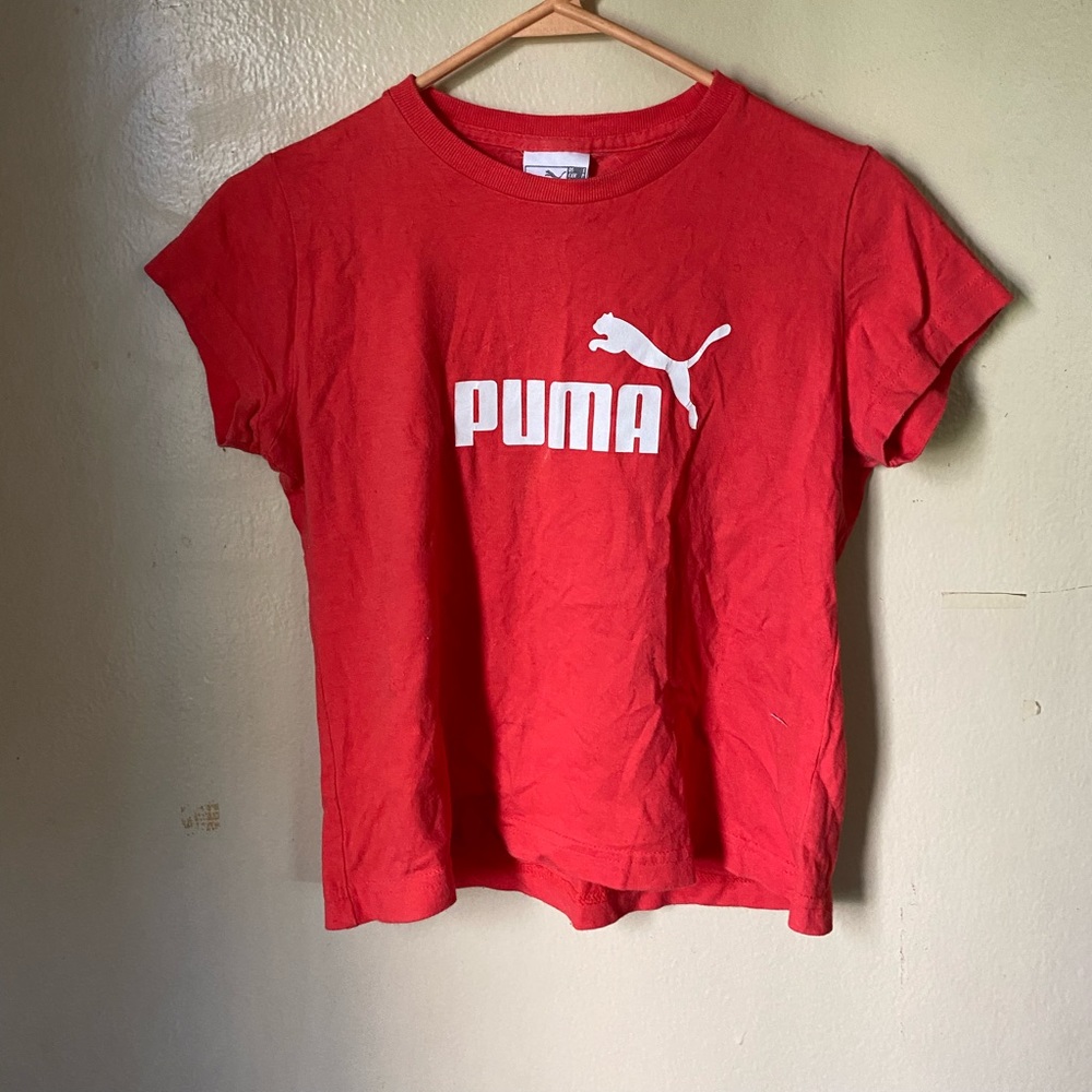 This coral pink thrifted Puma Tee is adorable and pairs well with jeans or skirt